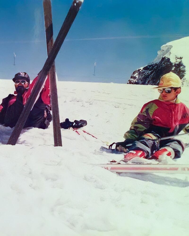 Sheikh Hamdan with his father Sheikh Mohammed bin Rashid on the slopes.