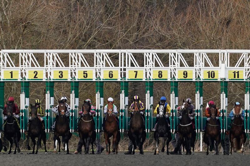 SUNBURY, ENGLAND - FEBRUARY 06: A general view as runners leave the stalls in The Move Over To Matchbook Handicap at Kempton Park Racecourse on February 06, 2019 in Sunbury, England. (Photo by Alan Crowhurst/Getty Images)