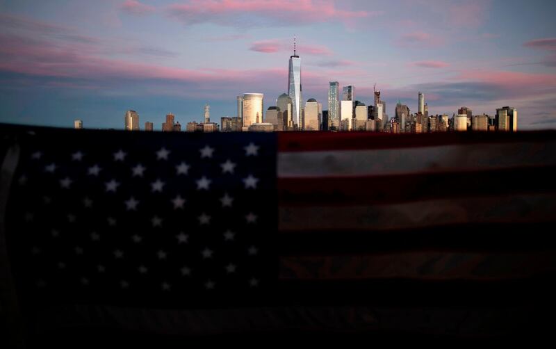 An American flag is seen in front of the Manhattan skyline in New York City. AFP