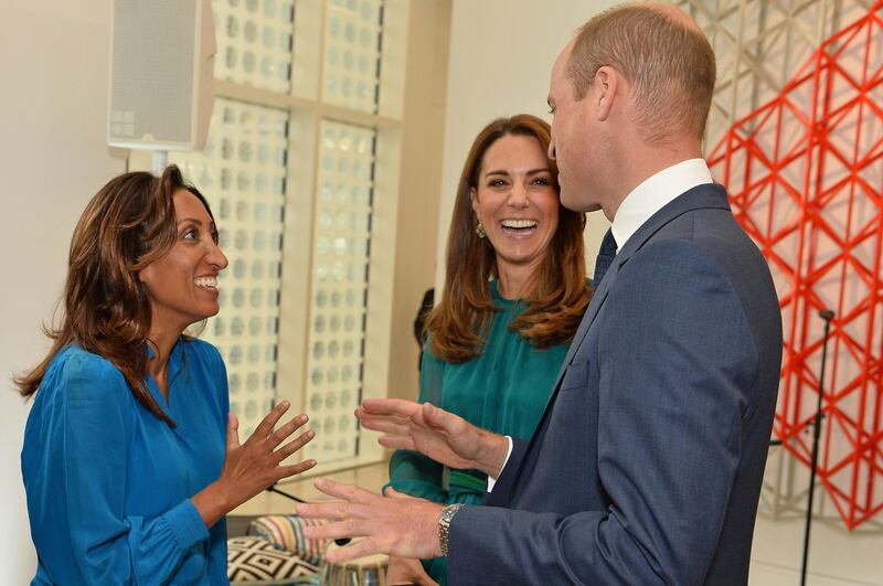 Britain's Prince William, Duke of Cambridge and Britain's Catherine, Duchess of Cambridge chat with English stand-up comedian Shazia Murza during their visit to the Aga Khan Centre in London. AFP