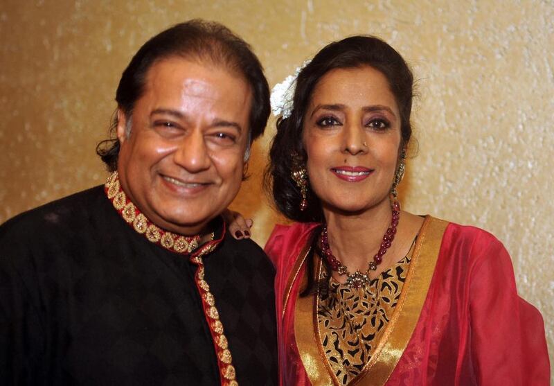The Indian singer Anup Jalota, left, with his wife Medha in July this year. AFP PHOTO/STR