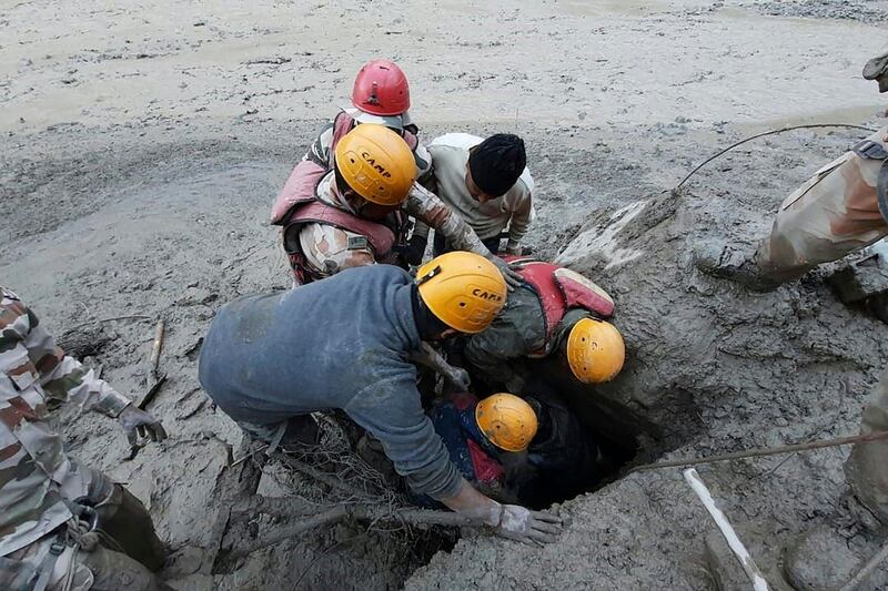 Members of the Indo-Tibetan Border Police search underground for survivors in Reni village after a flash flood in the Chamoli district of Uttarakhand state. AFP