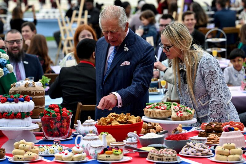 Prince Charles looks at decorations at The Oval cricket ground. Reuters