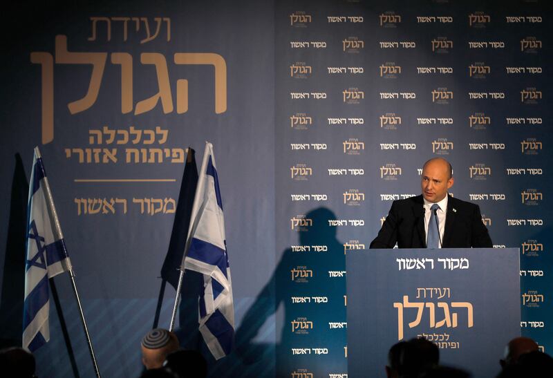 Israeli Prime Minister Naftali Bennett speaks at a conference on economics and regional development in the occupied Golan Heights, on October 11. AFP