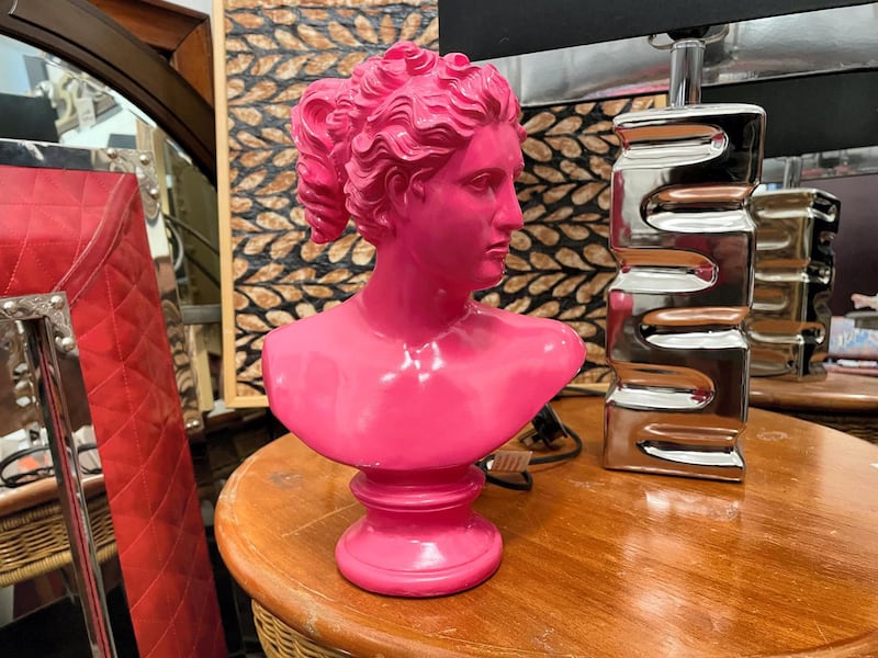 A repainted pink bust, Dh180, at La Brocante.