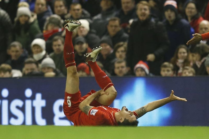 Liverpool's Dejan Lovren sustains an injury to his leg against West Brom. Reuters / Phil Noble