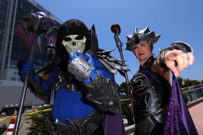 Attendees pose for a picture at Comic Con International. Mike Blake / Reuters