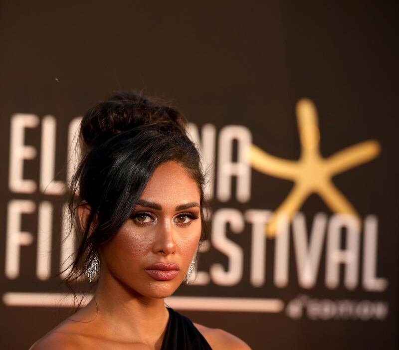 Egyptian model and television celebrity Enjy Kiwan walks the red carpet at the opening ceremony of the El Gouna Film Festival, in the Egyptian Red Sea resort of El Gouna. AFP