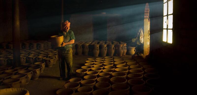ELYES GUEBBAL ALGERIA
This photo was taken in a pottery workshop in south Tunisia, as we can see the old craftsman while working. Credit: National Geographic. 