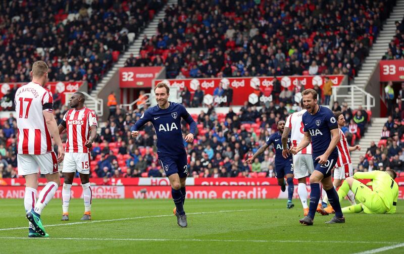 Tottenham Hotspur's Christian Eriksen celebrates scoring his side's first goal of the game during the English Premier League soccer match between Stoke City and Tottenham Hotspur at the bet365 Stadium Stoke, England. Saturday, April 7, 2018, 2018. (Nigel French/PA via AP)