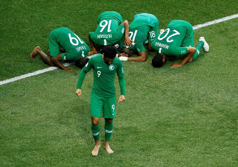 Saudi Arabia players celebrate after the match between Egypt.  Jason Cairnduff / Reuters