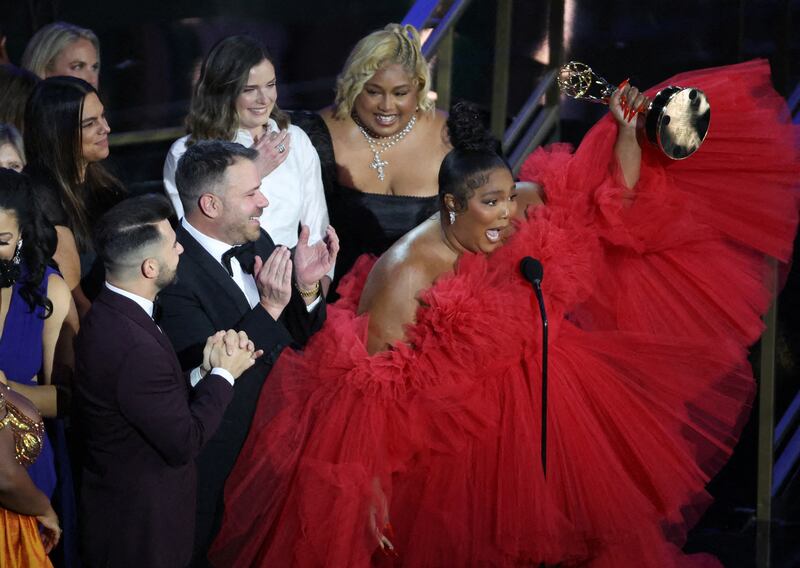 Lizzo and other cast members celebrate a win at the Primetime Emmy Awards in Los Angeles in September. Reuters