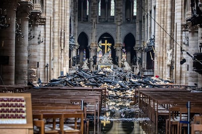 Light poured into Notre Dame after the fire gutted its roof – but much of its artwork survived. EPA 