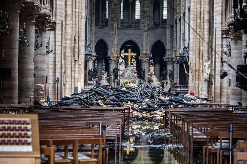 Light shines inside the Notre-Dame cathedral in the aftermath of the blaze. EPA