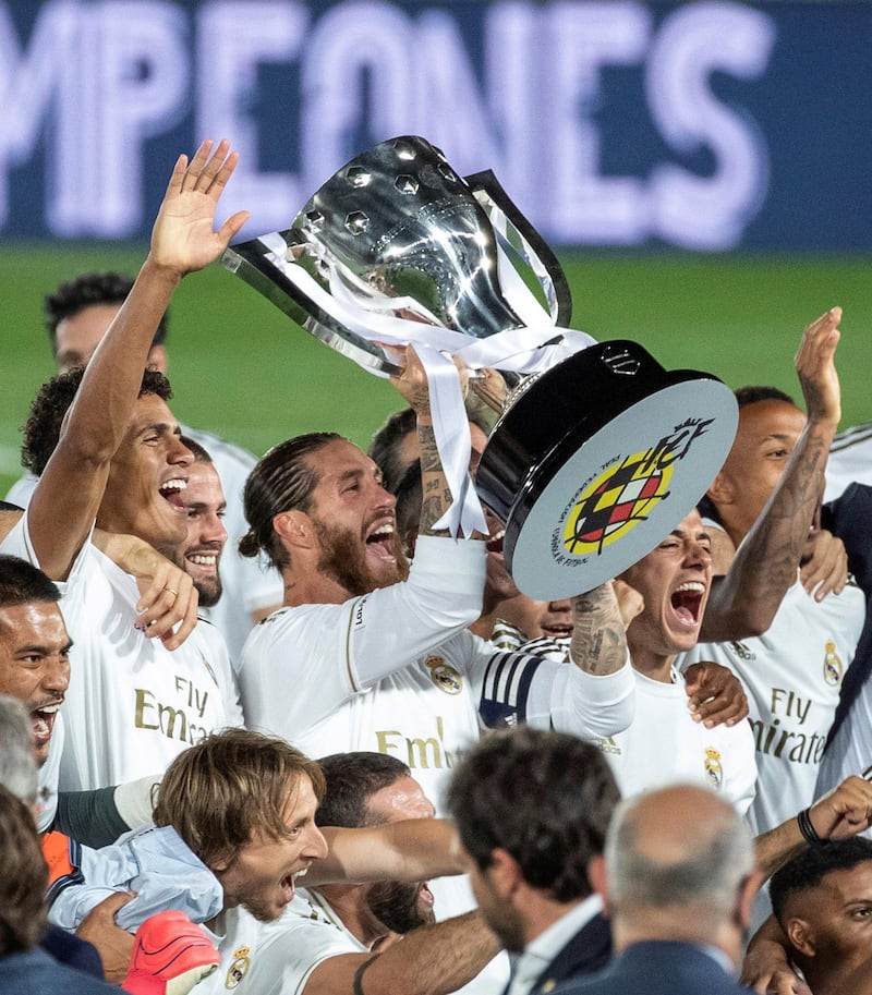 Real Madrid's captain Sergio Ramos lifts the La Liga trophy after their win over Villarreal CF at the Alfredo Di Stefano Stadium on Thursday. EPA