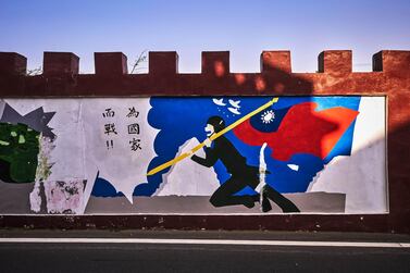 Paintings commemorating previous battles adorn a wall on February 04, 2021 in Lieyu, an outlying island of Kinmen that is the closest point between Taiwan and China. Kinmen, an island in the Taiwan strait that is part of Taiwan's territory. Getty Images.