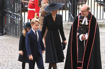 The Princess of Wales arrives at the funeral of Queen Elizabeth II with Princess Charlotte and Prince George. PA News 