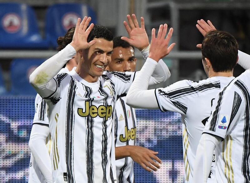 Cristiano Ronaldo celebrates scoring Juve's third goal to complete his hat-trick. Reuters