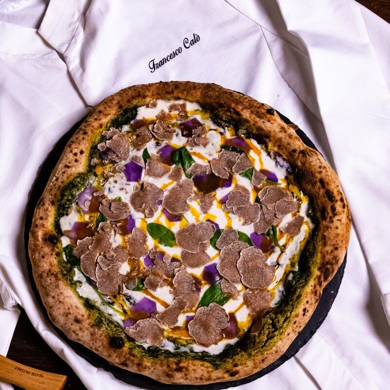 Pizza Magnatum at Via Toledo is garnished white Alba truffles, one of the priciest and most decadent ingredients in the world. Photo: Via Toledo / Instagram