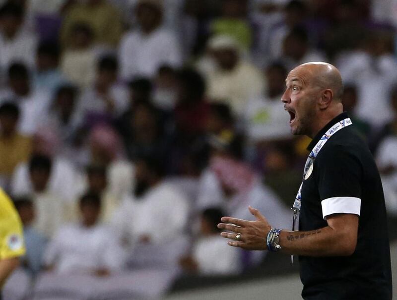 Al Jazira manager Walter Zenga shouts instructions to his players during their match against Al Ain on Tuesday. Karim Sahib / AFP / May 13, 2014