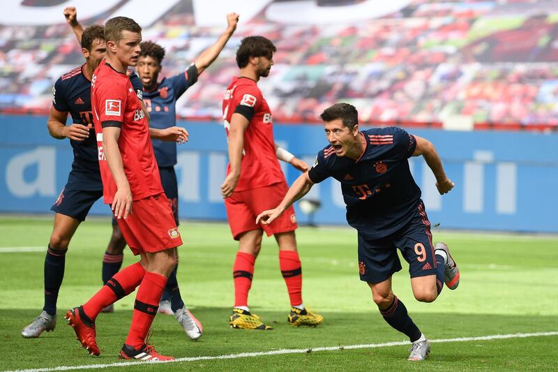 Robert Lewandowski celebrates after scoring Bayern's fourth goal against Leverkusen. Getty Images Getty Images