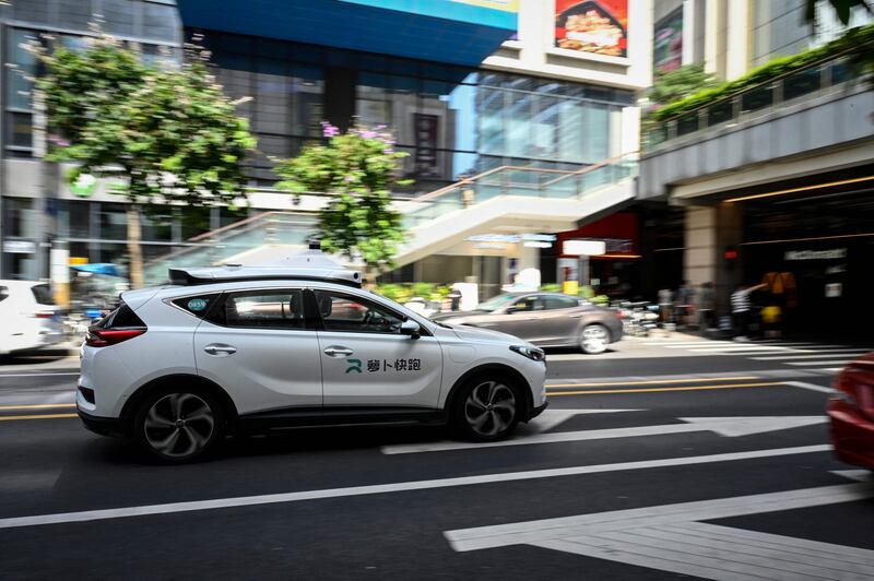 An Apollo Go robotaxi in Shenzhen. Baidu's RT6 model uses 38 sensors, including eight light detection and ranging remote sensors and 12 cameras, to obtain 'highly accurate, long-range detection on all sides'. AFP