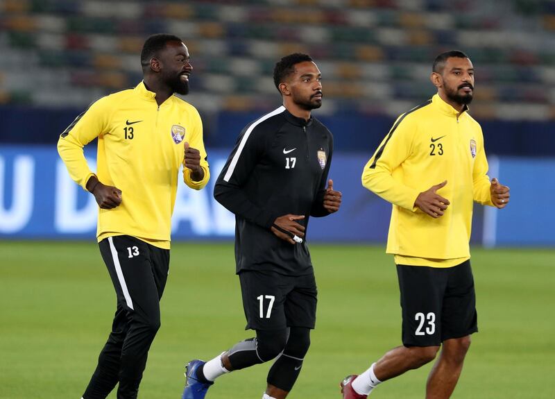 Abu Dhabi, United Arab Emirates - December 21, 2018: Mohamed Ahmed, Ahmed Barman (L) and Khalid Essa (M) of Al Ain train ahead of the Fifa Club World Cup final. Friday the 21st of December 2018 at the Zayed Sports City Stadium, Abu Dhabi. Chris Whiteoak / The National
