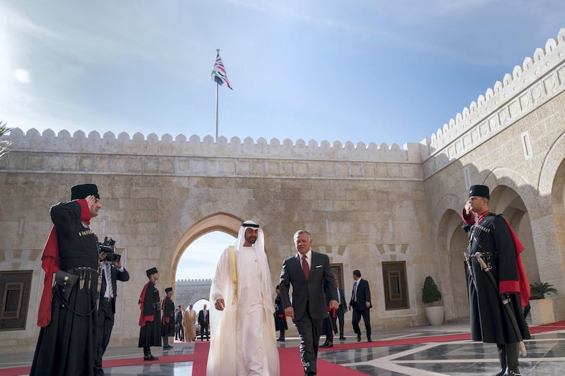 AMMAN, JORDAN - November 20, 2018: HH Sheikh Mohamed bin Zayed Al Nahyan Crown Prince of Abu Dhabi Deputy Supreme Commander of the UAE Armed Forces (centre L) and HM King Abdullah II, King of Jordan (centre R), arrives at Al Husseiniya Palace.
( Mohamed Al Hammadi / Ministry of Presidential Affairs )
---