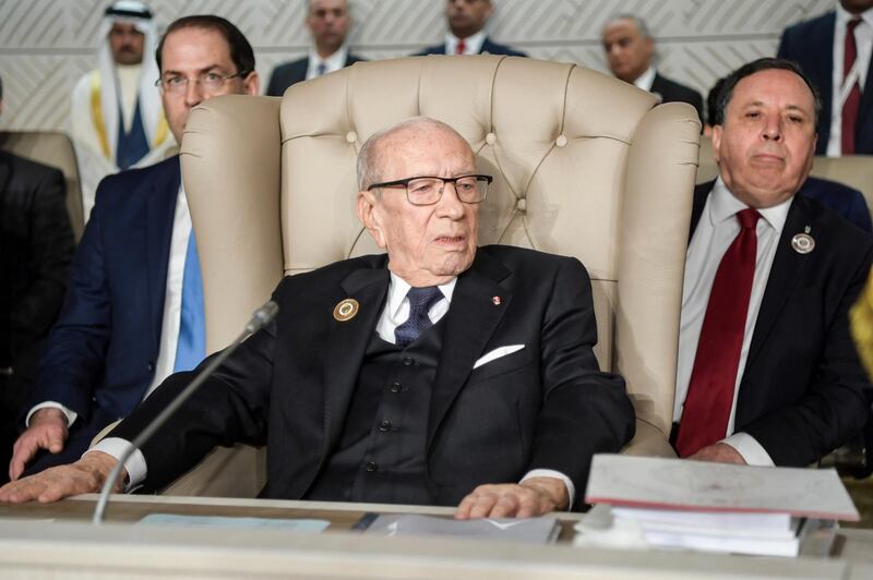 Tunisia's President Beji Caid Essebsi, centre, and his Prime Minister Youssef Chahed, right, attend the opening of the 30th Arab Summit in Tunis, Tunisia.  AP