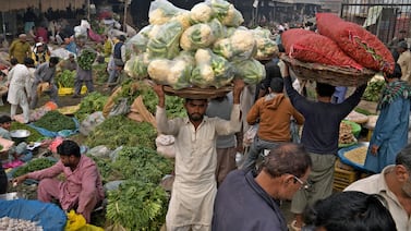 A market in Lahore, Pakistan. Debt levels among low-income countries have soared since central banks lifted interest rates in response to rising inflation. AP