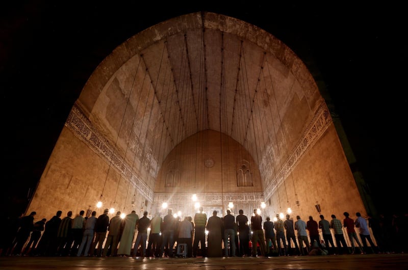 Egyptian Muslims perform evening prayers called 'Tarawih' inside Al Sultan Hassan mosque during the Muslim holy fasting month of Ramadan in the old Islamic area of Cairo, Egypt. Amr Abdallah Dalsh / Reuters