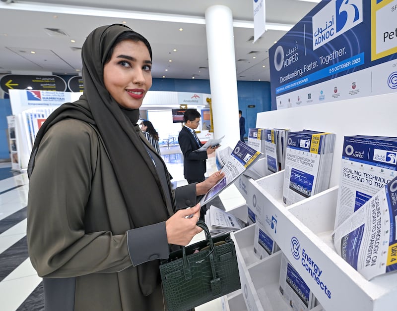 A visitor to Adipec 2023 on day four