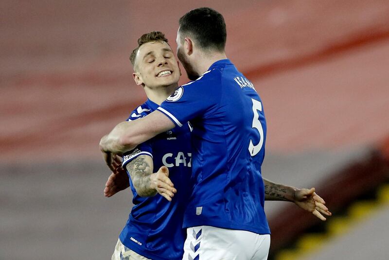 Everton players Lucas Digne (L) and Michael Keane  celebrate after the final whistle. EPA