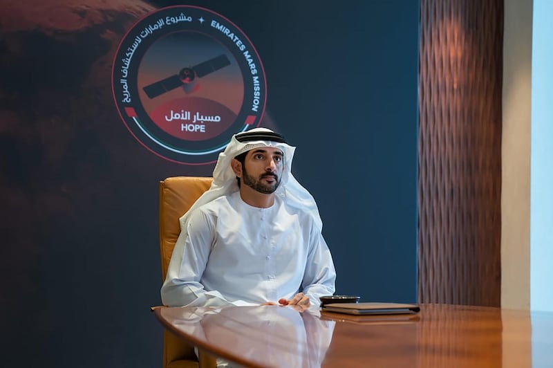 Sheikh Hamdan bin Mohammed, Crown Prince of Dubai, listens to the broadcast