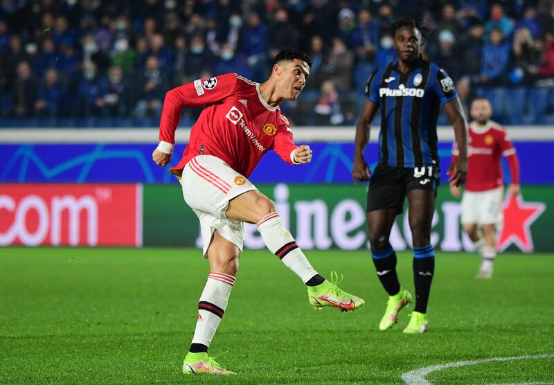 Manchester United's Cristiano Ronaldo scores their second goal. Reuters