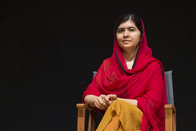 Malala Yousafzai sits on stage in Abu Dhabi on Wednesday during a preview of  ‘He Named Me Malala’, a documentary film about her and her family’s experiences in Pakistan’s Swat Valley. Reem Mohammed / The National