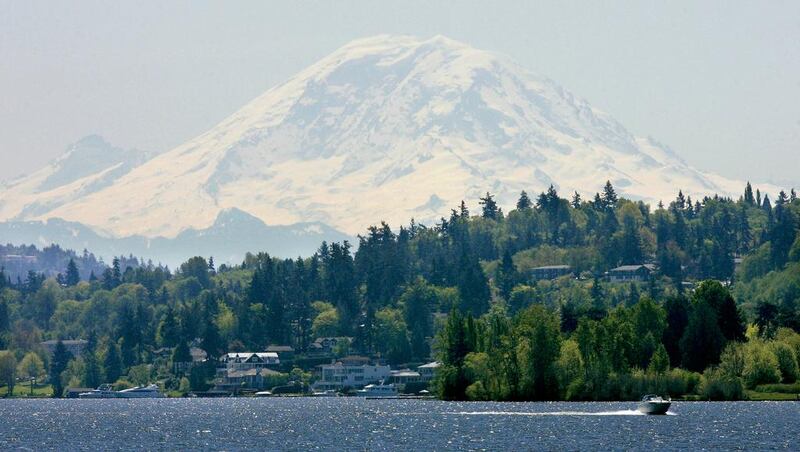 Mount Rainier looms over Lake Washington in Seattle. Ted Warren / AP Photo