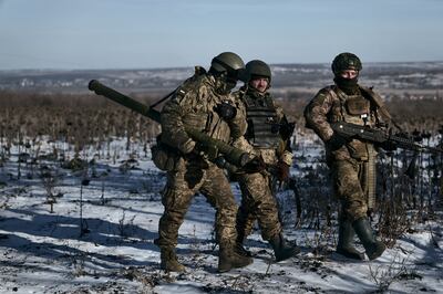 Ukrainian soldiers on the front line near Soledar. AP 