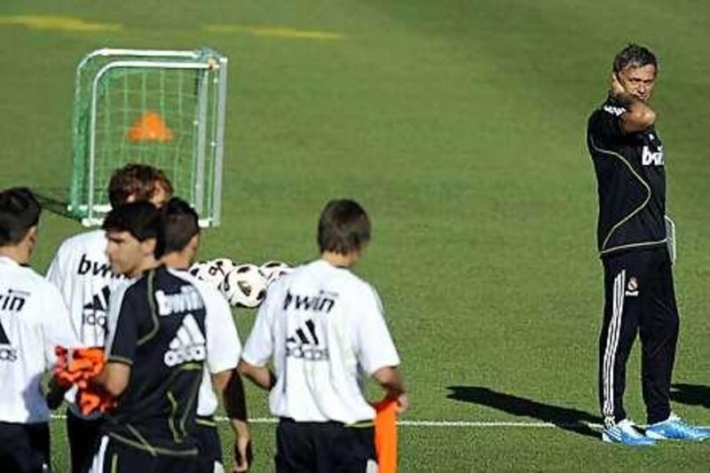 Jose Mourinho, Real Madrid's new coach, right, has added Pedro Leon, the midfielder, to his impressive team for next season.