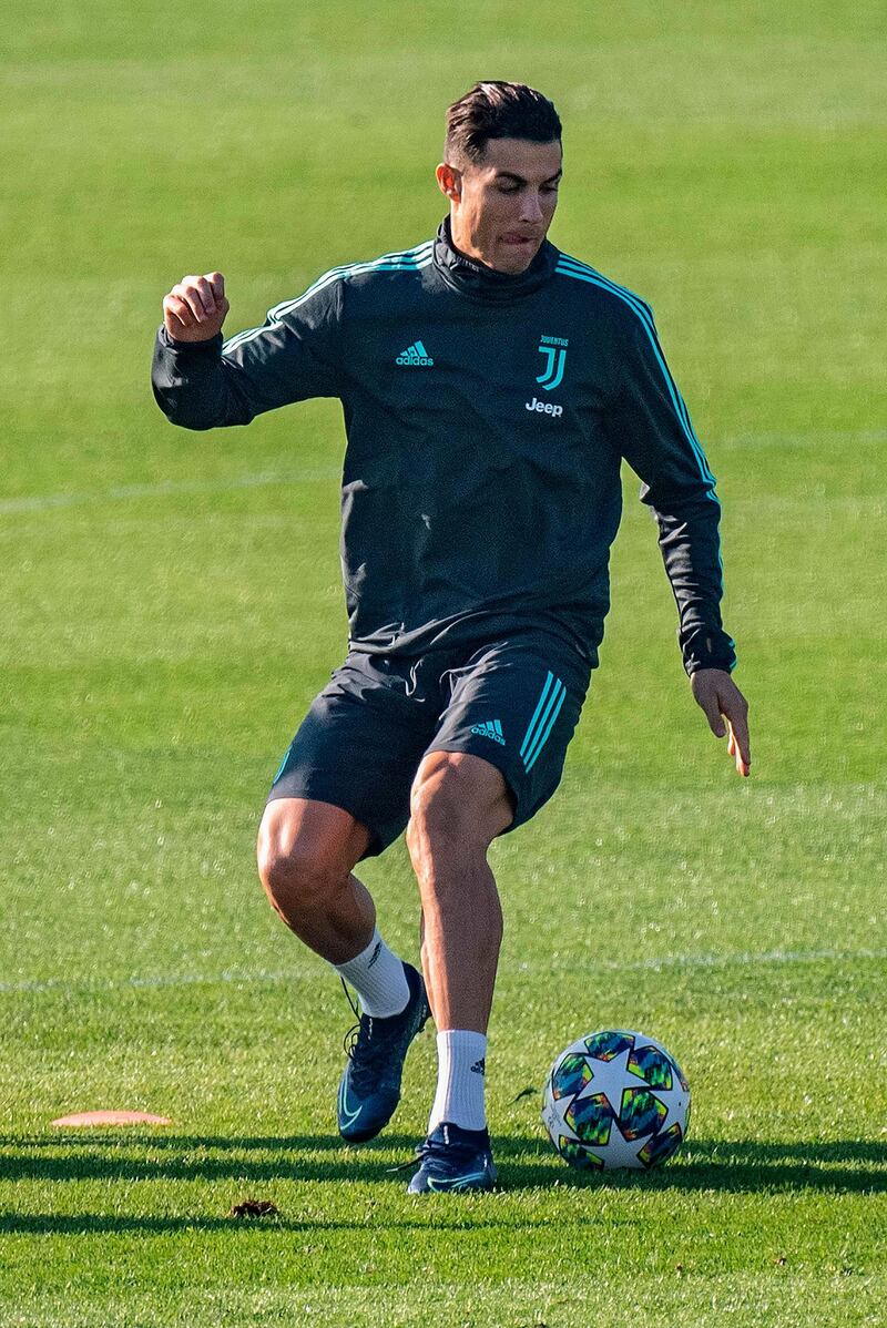 Ronaldo controls the ball during training ahead of the Lokomotiv Moscow match. AFP