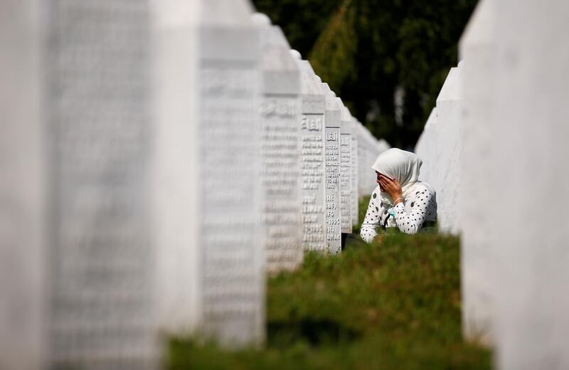 A woman cries at a graveyard, ahead of a mass funeral in Potocari near Srebrenica, Bosnia and Herzegovina. Reuters