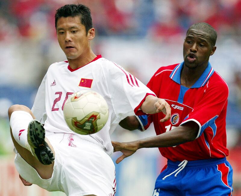 China's Chen Yang kicks the ball in front of Costa Rica's Harold Wallace during their 2022 World Cup match in Kwangju.