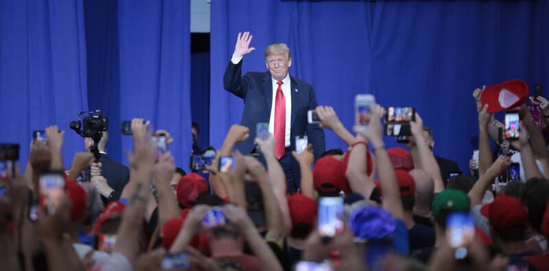 epaselect epa06928174 US President Donald J. Trump greets his supporters during a rally at the Olentabgy Orange High School, in Lewis Center, Ohio, USA, 04 August 2018. President Trump is appearing at several Make America Great Again rallies around the country.  EPA/MARK LYONS