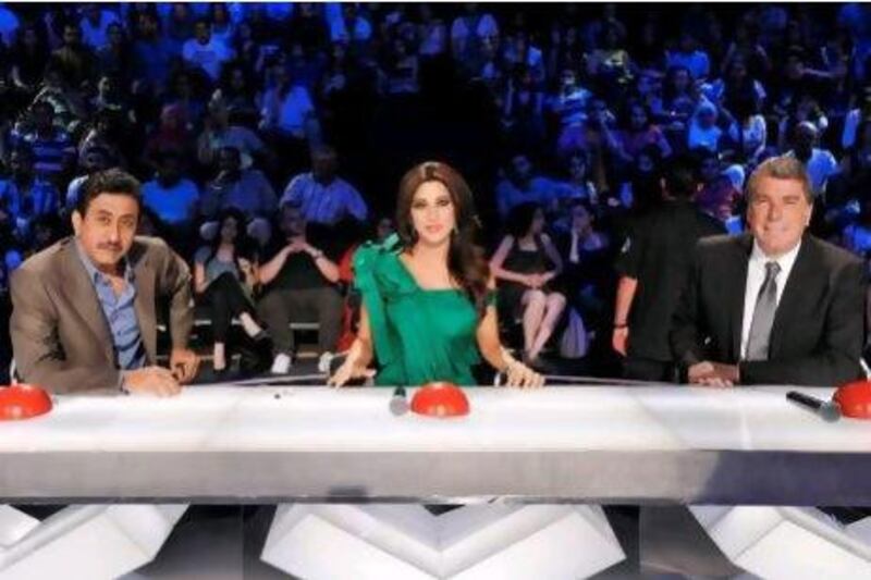 The judges on Arabs Got Talent, from left, Nasser Al Qasabi, Najwa Karam and Ali Jaber. Courtesy of MBC