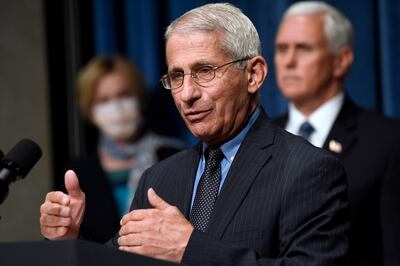 FILE - In this June 26, 2020, file photo Director of the National Institute of Allergy and Infectious Diseases Dr. Anthony Fauci, center, speaks as Vice President Mike Pence, right, and Dr. Deborah Birx, White House coronavirus response coordinator, left, listen during a news conference with members of the Coronavirus task force at the Department of Health and Human Services in Washington. Fauci has warned that the United States could soon see 100,000 infections per day. â€œWe havenâ€™t even begun to see the end of it yet,â€ Fauci said during a talk hosted by Stanford Universityâ€™s School of Medicine. (AP Photo/Susan Walsh, File)