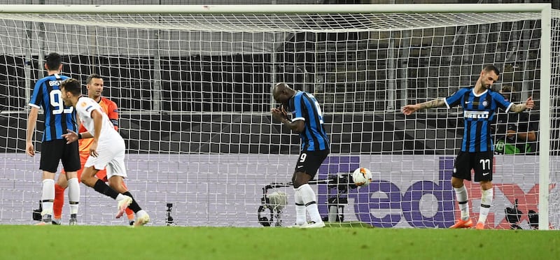Romelu Lukaku (C) of Inter reacts after his own goal. EPA