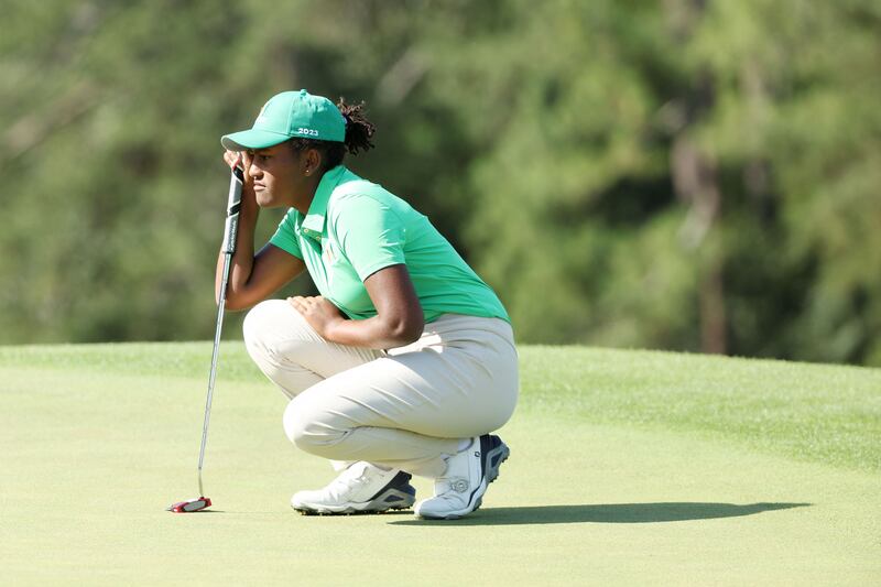 Maya Gaudin lines up a putt during the Drive, Chip and Putt Championship at Augusta National Golf Club. AFP