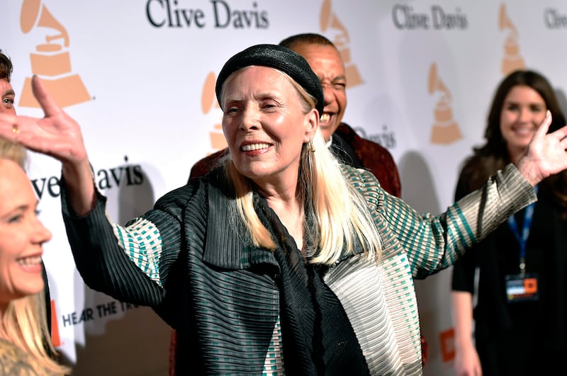 Joni Mitchell said she was also removing all of her music from Spotify in solidarity with Young. AP
