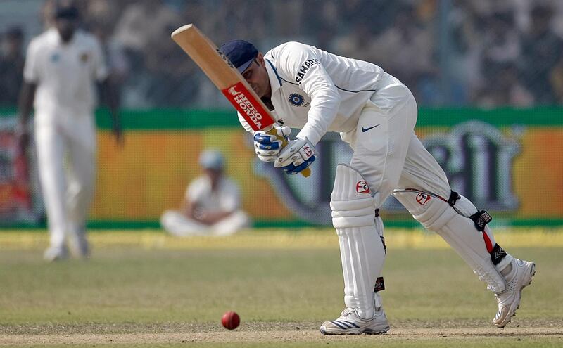 India's Virender Sehwag plays a shot during the first day of their second test cricket match against Sri Lanka in Kanpur November 24, 2009. REUTERS/Adnan Abidi (INDIA SPORT CRICKET)
