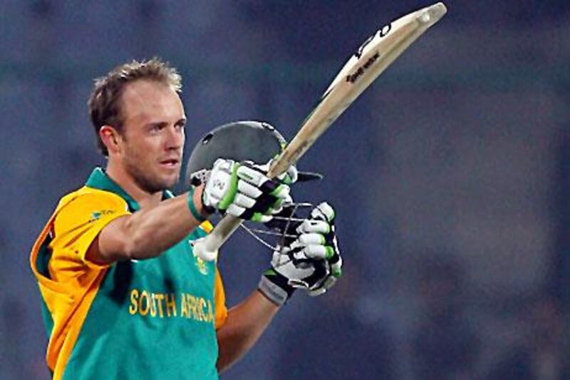 South Africa's AB de Villiers celebrates after scoring his century against the West Indies.